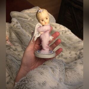 "Take Time Out" Marie Osmond toddler with a blanket porcelain figurine.